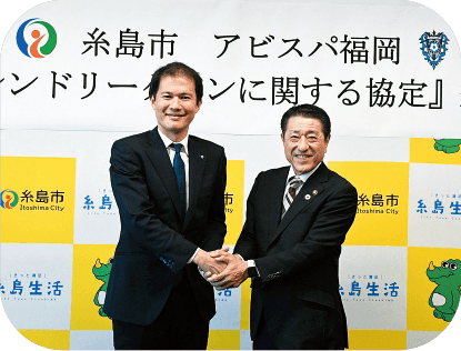 アビスパ福岡株式会社の結城耕造代表取締役社長（左）と月形市長（右）
